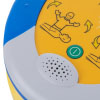 a close up view of the sounder on the AED for voice prompts and the green on button 