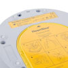 a back view of the trainer unit with the yellow training pad-pak inserted showing images on how to use and place the electrodes on a patient