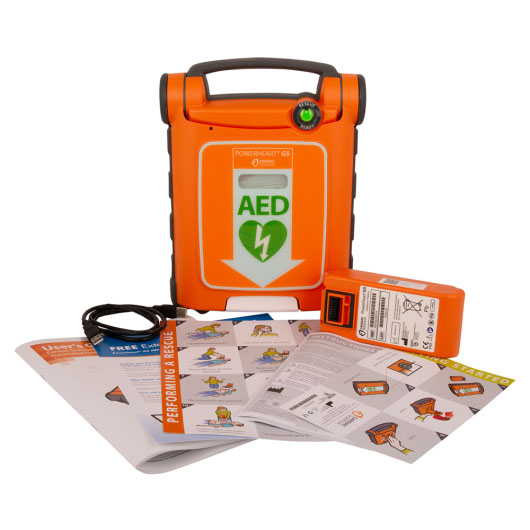 A bright orange defibrillator with all its contents