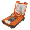 A bright orange defibrillator with a set of electrode pads