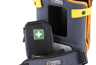 A close-up of a grey and orange defibrillator case