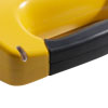A close-up of the handle on a yellow and black defibrillator