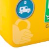 Close-up detail of the yellow polycarbonate outdoor defibrillator cabinet heating light showing corner with printed symbols