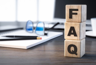 A stack of blocks with the letters F.A.Q