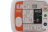 A white fully automatic defibrillator with an orange strip