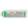 A white replacement defibrillator battery with a green label
