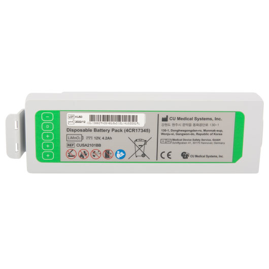 A white replacement defibrillator battery with a green label