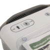 A close-up of the adult / child mode button