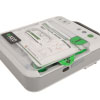 An artistic image of a white defibrillator with green markings