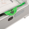 A close-up of the green pull tab to release the defibrillator pads