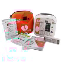 Ipad Sp1 Fully Automatic Defibrillator All Contents A white defibrillator next to a bright orange carry case