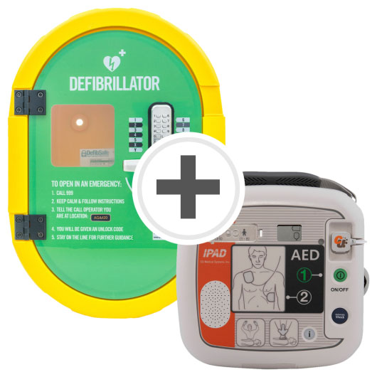 A green and yellow defibrillator cabinet with a white and orange defibrillator