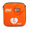 Orange AED carry case labeled iPAD Intelligent Public Access Defibrillator with heart and lightning bolt symbol.