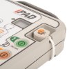 Close up of the pad connector on an ipad spr semi auto defibrillator showing the attached cable and control panel