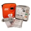 ipad spr semi auto defibrillator full kit including case device battery and pads laid out on a white background