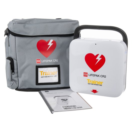 Physio Control Likepak Cr2 Trainer Unit physio control lifepak cr2 trainer unit showing the main device, a grey carry case with heart logo, and an instruction manual