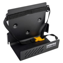 a black bracket with white writing stating Lifepak Defibrillator to keep a lifepak 1000 defibrillator in with a black strap and yellow buckle