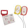A set of white replacement electrode pads with a red pull handle