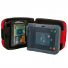 A dark and light blue defibrillator in front of its protective case