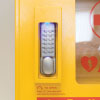 a close up of the numbered key code lock underneath in red it reads to open, press C then enter code and rotate the handle clock wise