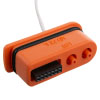 an orange connector with a black seal in an oblong shape with a white cable