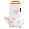 AED unit positioned beside an illustrated quick‑start sheet and the Mediana HeartOn A16 operator’s manual.