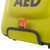 Close-up of zoll aed 3 carry case showing the orange tab on a yellow surface with black edging