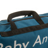 close up of black handles attached to a blue holdall style bag with baby anne in white text