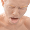 close up of the face of a simulated choking manikin for practice and first aid training