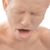 closeup of the laerdal choking charlie training manikin showing facial features and open mouth