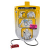 a fellow and black foil pouch with a drawing of a mans torso showing where the training defibrillator pads should be placed. There is a bright pink label with black writing stating training pads