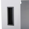 close up of a rectangular dark grey plastic finger hold to open the door of a white metal cabinet  