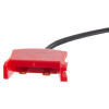 a red connector plug with two brass coloured prongs with a black wire attached to it