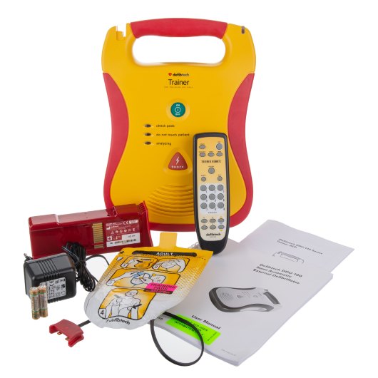 Defibtech Lifeline Aed Trainer Unit defibtech lifeline aed trainer unit with remote control, battery, pads, charger, and instruction manual laid out