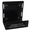 an angled black metal mounting bracket for a defibrillator, there are 4 drill holes at the back and at the front is says emergency defibrillator in silver text
