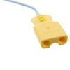 a close up of the pale yellow connector with two round holes to connect to the trainer defib with a blue and white lead 