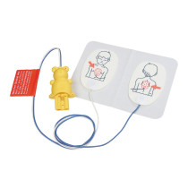 Stjfr2Ptp Philips Heartstart Fr2 Trainer Infant Child Pads a set of pads with a drawn image of a young male torso showing the correct pad replacement, there is a blue and white wire attached to a yellow connector block in the shape of a teddy bear