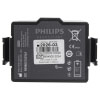 a front shot of a square shaped black battery, there is writing grey showing the make and model which is Phillips heartstart, there is the manufactures address and the install begore date shown  