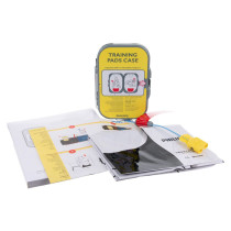 Stjfrxtpc Philips Heartstart Frx Defibrillator Training Pads Ii Cartridge Contents grey case with yellow label showing the pad placement for training purposes. The text says training pads case and there are 2 wire, one blue and one white leading to a yellow connector block with the manual and placement mat showing in the front