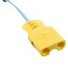 Yellow connector part of the Philips HeartStart FRx defibrillator training pads II cartridge with a blue cable attached