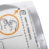 Close up corner of cardiac science powerheart g3 defibrillator adult training pads packaging with tear here to open instructions