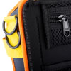 a close up shot of the strap loops located on the top corners of the bag with a bright yellow strapping.