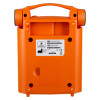 Rear view of an orange cardiac science training device showing the product label, serial number, compliance symbols, and a battery compartment.