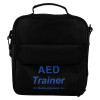 Black fabric carrying case with a top handle and front pocket, printed with blue text indicating it is for an AED training device