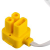 Close-up of a bright yellow electrical connector with three socket shapes attached to a white cable.