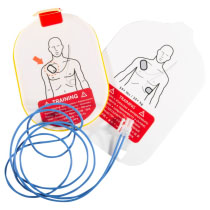 Stjhs1Atp Philips Heartstart Hs1 Adult Training Pads Front 2 white oval shaped pads with a yellow edge in the centre is a drawn outline image of a male showing the head and torso, there is a red arrow point to the correct pad placement for defib pads connected together by 2 blue wires and a connector block