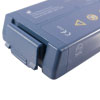 a close up of the clip to fit the blue battery into the defibrillator, there is also the CE mark shown in white 