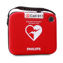a front shot of the heartstart hs1 slim carry case with branding of heartstart and philips in white on a bright red case
