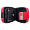 a shot of the inside of the carry case for the Philips HeartStart FRx defibrillator with a pocket for additional or spare pads. a Velcro strap fastening with the emergency number on