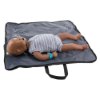 laerdal little baby qcpr training manikin with carry bag dark skin lying on its back on the carry bag front view